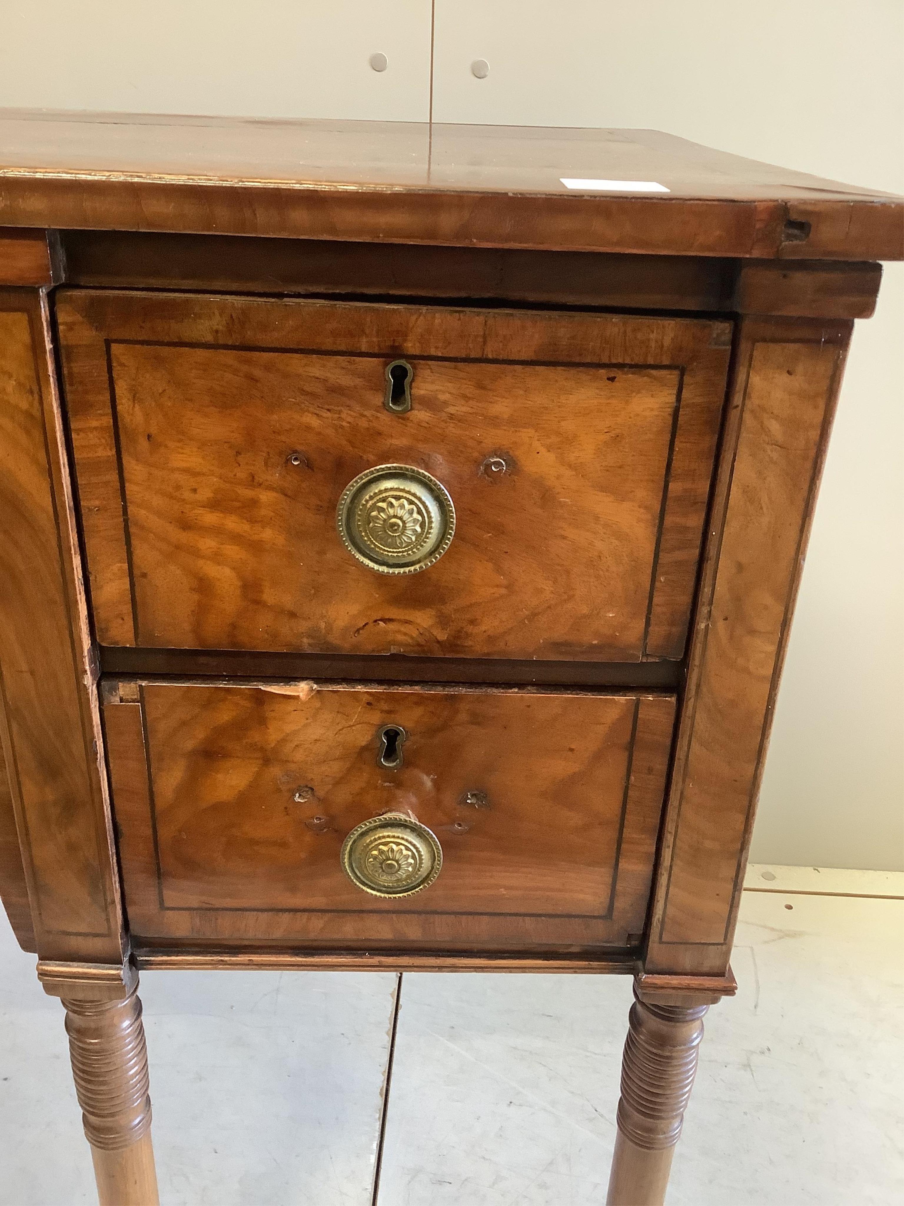 A Regency mahogany sideboard, width 137cm, depth 60cm, height 84cm. Condition - poor